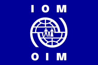 [flag of the International Organization for Migration (IOM)]