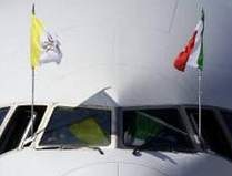 papal jet in Italy showing flags