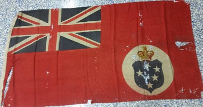 [Depiction of Victorian red ensign with blue disc]