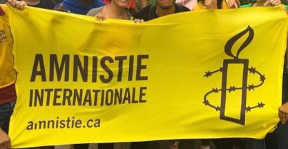 [Amnesty International Flag]